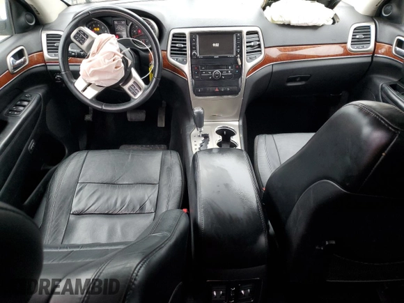 2013 Jeep Grand Cherokee Limited with VIN 1C4RJEBG5DC657005, listed as a Copart auction lot 84101024 with 124,055 mi miles and Salvage Title. Bid and sale history available at carsss.com. Image 8.