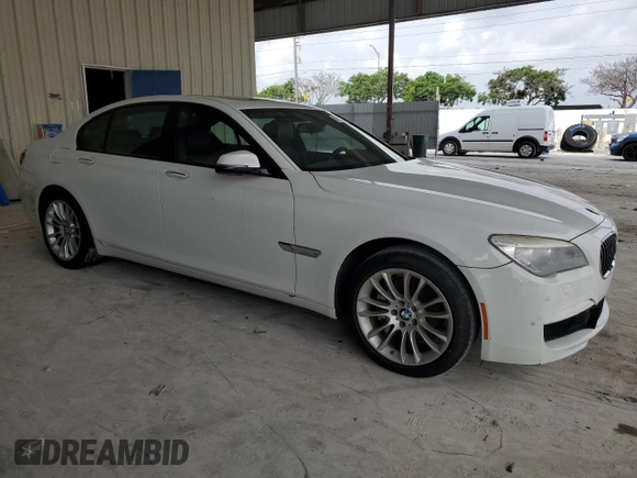 2013 BMW 7 Series 740i with VIN WBAYA6C5XDD143639, listed as a Copart auction lot 62296694 with 97,082 mi miles and Salvage Title. Bid and sale history available at carsss.com. Image 4.