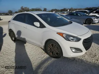 2013 Hyundai Elantra GT with VIN KMHD35LE4DU023756, listed as a Copart auction lot 77706604 with Not Provided miles and Salvage Title. Bid and sale history available at carsss.com. Image 4.
