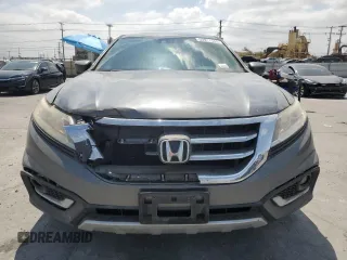 2013 Honda Crosstour EX-L z VIN 5J6TF1H59DL002040, wystawiony jako Copart lot #53917545 z przebiegiem 183 093 mil mil oraz Szkody całkowita. Historia ofert i sprzedaży dostępna na DreamBid. Obrazek 5.