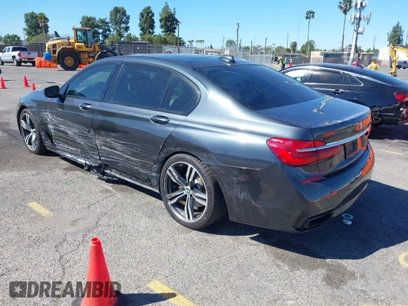 2016 BMW 7 Series 740i with VIN WBA7E2C52GG548048, listed as a IAAI auction lot 41701806 with 72,680 mi miles. Bid and sale history available at carsss.com. Image 3.