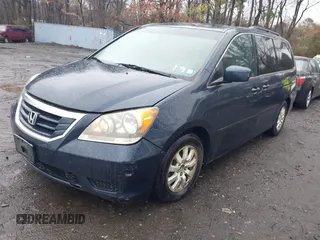 2010 Honda Odyssey EX with VIN 5FNRL3H41AB061674, listed as a IAAI auction lot 41954700 with 115,722 mi miles. Bid and sale history available at carsss.com. Image 2.