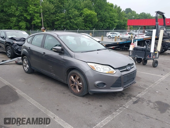 2014 Ford Focus SE with VIN 1FADP3K20EL104271, listed as a IAAI auction lot 39596262 with 81,021 mi miles. Bid and sale history available at carsss.com. Image 1.