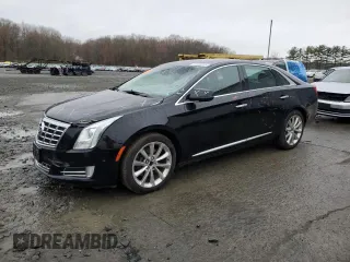 2014 Cadillac XTS Luxury with VIN 2G61M5S35E9138744, listed as a Copart auction lot 51545615 with 61,661 mi miles and Salvage Title. Bid and sale history available at carsss.com. Image 1.