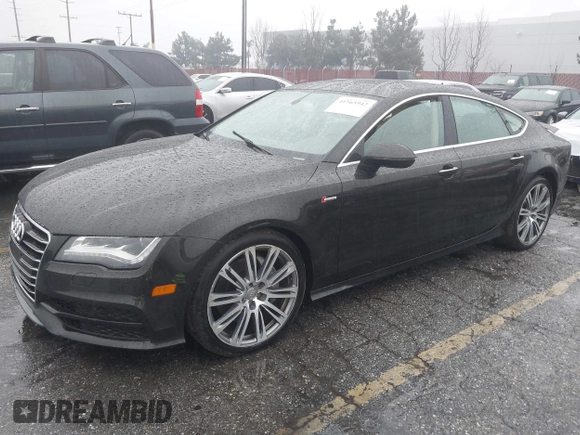 2014 Audi A7 3.0 Prestige with VIN WAU2GAFC5EN090233, listed as a IAAI auction lot 41565942 with 199,890 mi miles. Bid and sale history available at carsss.com. Image 22.