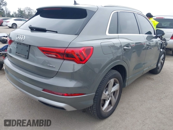 2020 Audi Q3 Premium with VIN WA1AECF32L1061271, listed as a IAAI auction lot 42038795 with 23,902 mi miles and . Bid and sale history available at DreamBid. Image 4.