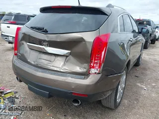 2014 Cadillac SRX Performance Collection with VIN 3GYFNCE31ES509461, listed as a IAAI auction lot 41908431 with 150,915 mi miles. Bid and sale history available at carsss.com. Image 6.