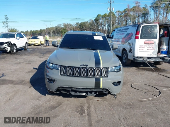 2021 Jeep Grand Cherokee Laredo E with VIN 1C4RJEAG3MC713511, listed as a IAAI auction lot 41235904 with 73,343 mi miles and . Bid and sale history available at DreamBid. Image 12.