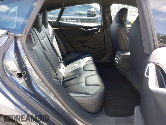 2017 Tesla Model S 100D with VIN 5YJSA1E27HF202563, listed as a IAAI auction lot 42460702 with 71,715 mi miles and . Bid and sale history available at DreamBid. Image 8.