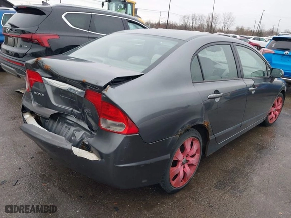 2009 Honda Civic Sdn LX with VIN 2HGFA16569H308963, listed as a IAAI auction lot 41936654 with 202,729 mi miles. Bid and sale history available at carsss.com. Image 4.