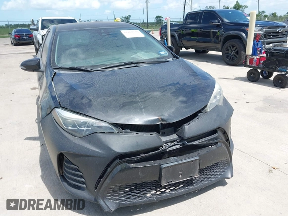 2017 Toyota Corolla L with VIN 5YFBURHE9HP576513, listed as a IAAI auction lot 42460720 with 217,852 mi miles and . Bid and sale history available at DreamBid. Image 6.
