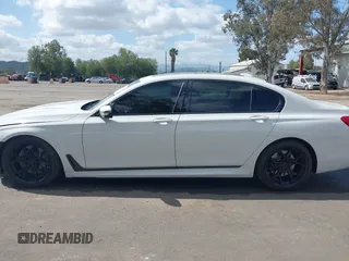 2017 BMW 7 Series 750i with VIN WBA7F0C32HGM22273, listed as a IAAI auction lot 41857151 with 90,518 mi miles and . Bid and sale history available at carsss.com. Image 14.