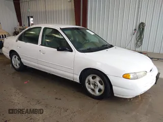 1997 Ford Contour LX with VIN 1FALP6537VK132379, listed as a IAAI auction lot 42771426 with 122,263 mi miles and . Bid and sale history available at DreamBid. Image 1.