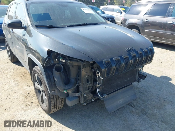 2015 Jeep Cherokee North with VIN 1C4PJMCS3FW777973, listed as a IAAI auction lot 42043203 with 158,536 mi miles. Bid and sale history available at carsss.com. Image 6.