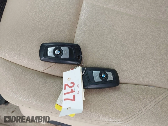 2015 BMW 3 Series 320i xDrive with VIN WBA3C3C55FP664465, listed as a IAAI auction lot 41608096 with 67,911 mi miles and . Bid and sale history available at DreamBid. Image 11.