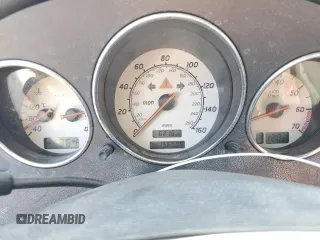 2001 Mercedes-Benz SLK-Class with VIN WDBKK65F61F209470, listed as a Copart auction lot 54976364 with 156,005 mi miles and Salvage Title. Bid and sale history available at carsss.com. Image 9.