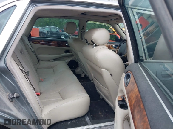 2002 Jaguar XJ with VIN SAJDA12CX2LF49531, listed as a IAAI auction lot 42124743 with 120,486 mi miles. Bid and sale history available at carsss.com. Image 8.