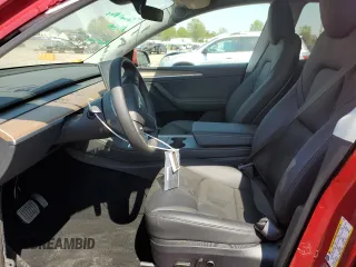 2025 Tesla Model Y Long Range z VIN 7SAYGDEE4SF260712, wystawiony jako Copart lot #54208975 z przebiegiem 1054 mil mil oraz Szkoda całkowita • Salvage title. Historia ofert i sprzedaży dostępna na DreamBid. Obrazek 7.