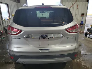 2014 Ford Escape Titanium с VIN 1FMCU0J98EUA35069, выставлен на аукционе Copart как лот 58369635 с пробегом 92 323 миль миль и Списание • Salvage title. История ставок и продаж доступна на DreamBid. Изображение 6.