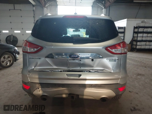 2015 Ford Escape Titanium z VIN 1FMCU9J96FUB23902, wystawiony jako IAAI lot #42497188 z przebiegiem 164 452 mil mil oraz . Historia ofert i sprzedaży dostępna na DreamBid. Obrazek 16.