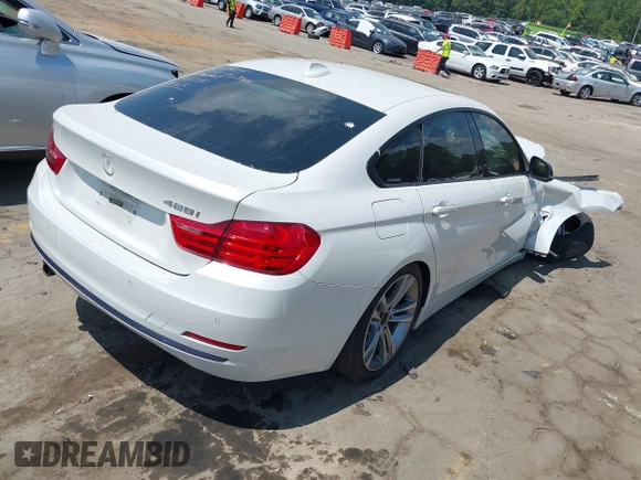 2015 BMW 4 Series 428i with VIN WBA4A5C56FG052023, listed as a IAAI auction lot 40085862 with 90,796 mi miles and . Bid and sale history available at carsss.com. Image 4.