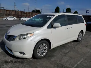 2016 Toyota Sienna XLE with VIN 5TDYK3DC6GS744261, listed as a Copart auction lot 56965255 with 104,083 mi miles and Salvage title. Bid and sale history available at DreamBid. Image 1.