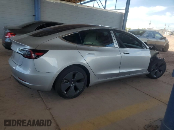 2018 Tesla Model 3 Long Range Battery with VIN 5YJ3E1EA2JF016631, listed as a Copart auction lot 55527095 with 129,547 mi miles and Salvage Title. Bid and sale history available at DreamBid. Image 3.