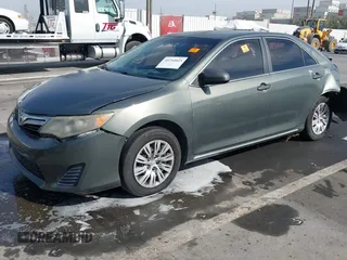 2014 Toyota Camry L with VIN 4T4BF1FK2ER404540, listed as a IAAI auction lot 40744025 with 1 mi miles. Bid and sale history available at carsss.com. Image 2.