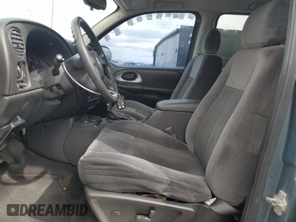 2009 Chevrolet TrailBlazer 1LT with VIN 1GNDS33S092130458, listed as a Copart auction lot 46877675 with 113,885 mi miles and Salvage Title. Bid and sale history available at DreamBid. Image 7.