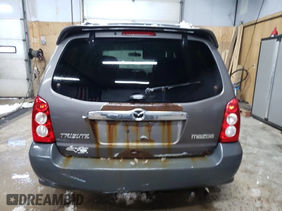 2006 Mazda Tribute i with VIN 4F2YZ92Z76KM27049, listed as a Copart auction lot 45468505 with 243,005 mi miles and Clean Title. Bid and sale history available at carsss.com. Image 6.