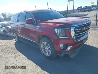 2021 GMC Yukon XL SLT with VIN 1GKS2GKD6MR144038, listed as a IAAI auction lot 41104213 with 98,318 mi miles. Bid and sale history available at carsss.com. Image 1.