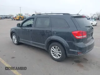2013 Dodge Journey SXT with VIN 3C4PDCBB2DT561182, listed as a IAAI auction lot 41616065 with 158,542 mi miles. Bid and sale history available at carsss.com. Image 3.