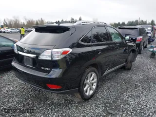2012 Lexus RX 350 with VIN JTJBK1BA9C2444708, listed as a IAAI auction lot 41890977 with 202,873 mi miles. Bid and sale history available at carsss.com. Image 4.