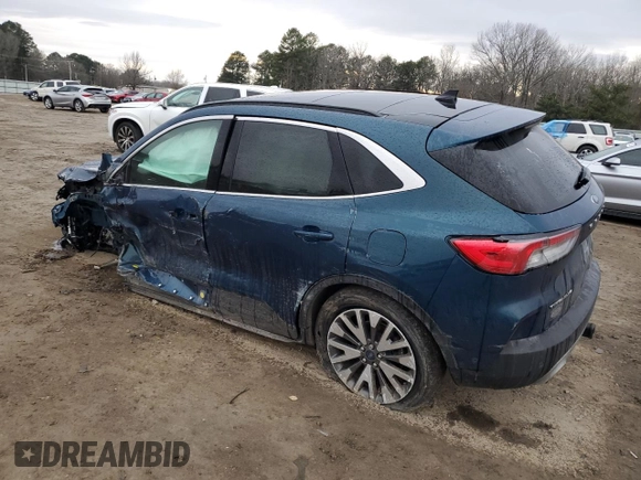 2020 Ford Escape Titanium z VIN 1FMCU9J91LUA73891, wystawiony jako Copart lot #89178475 z przebiegiem 35 579 mil mil oraz Szkoda całkowita • Salvage title. Historia ofert i sprzedaży dostępna na DreamBid. Obrazek 2.