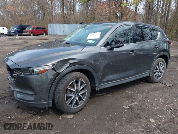 2018 Mazda CX-5 Grand Touring with VIN JM3KFBDM6J0388540, listed as a IAAI auction lot 41963726 with 103,148 mi miles. Bid and sale history available at carsss.com. Image 18.