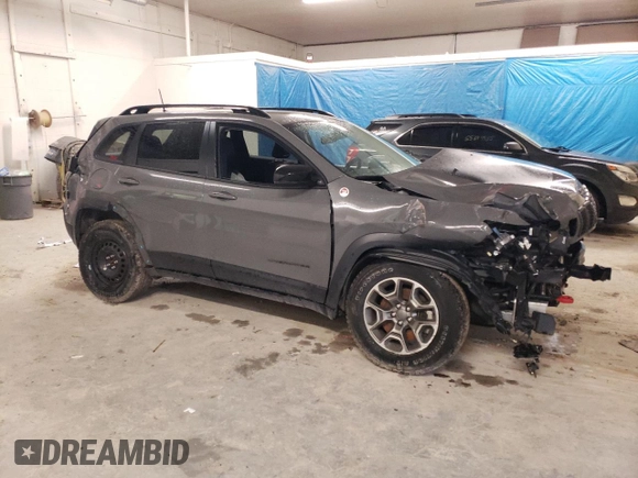 2022 Jeep Cherokee Trailhawk с VIN 1C4PJMBX3ND542805, выставлен на аукционе Copart как лот 54838505 с пробегом 44 692 миль миль и Чистый • Clean title. История ставок и продаж доступна на DreamBid. Изображение 4.