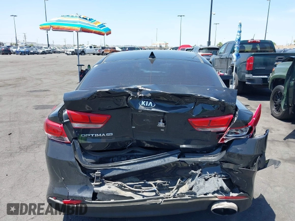 2020 Kia Optima LX with VIN 5XXGT4L32LG420025, listed as a IAAI auction lot 42288132 with 69,729 mi miles and . Bid and sale history available at DreamBid. Image 16.