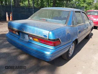 1992 Ford Tempo z VIN 1FAPP36U6NK188935, wystawiony jako IAAI lot #42133598 z przebiegiem 31 673 mil mil oraz . Historia ofert i sprzedaży dostępna na DreamBid. Obrazek 4.