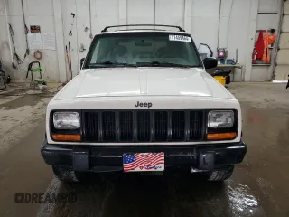 1997 Jeep Cherokee Sport with VIN 1J4FJ68S2VL518188, listed as a Copart auction lot 77459464 with 0 mi miles and Non Repairable. Bid and sale history available at carsss.com. Image 5.