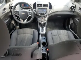 2016 Chevrolet Sonic LT with VIN 1G1JC5SH4G4119418, listed as a Copart auction lot 55809185 with 97,740 mi miles and Salvage title. Bid and sale history available at DreamBid. Image 8.