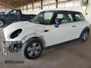 2014 MINI Hardtop with VIN WMWXM5C50ET933486, listed as a Copart auction lot 50823865 with 98,296 mi miles and Salvage Title. Bid and sale history available at DreamBid. Image 1.