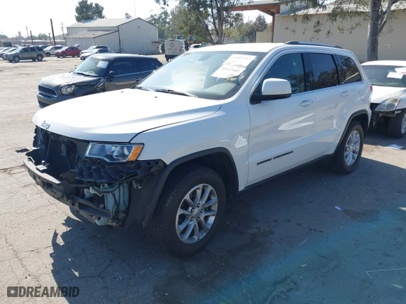 2021 Jeep Grand Cherokee Laredo X with VIN 1C4RJEAG3MC714500, listed as a IAAI auction lot 41637602 with 71,537 mi miles. Bid and sale history available at carsss.com. Image 18.