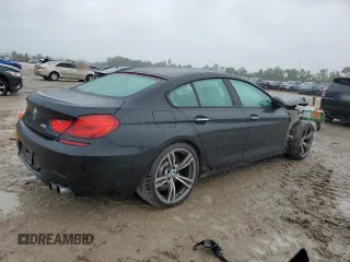 2015 BMW M6 z VIN WBS6C9C50FD467894, wystawiony jako Copart lot #70394234 z przebiegiem 72 625 mil mil oraz Szkoda całkowita • Salvage title. Historia ofert i sprzedaży dostępna na DreamBid. Obrazek 3.