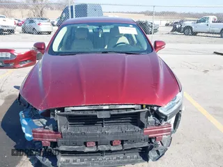 2014 Ford Fusion SE with VIN 3FA6P0HD3ER184909, listed as a IAAI auction lot 41905831 with 110,404 mi miles and . Bid and sale history available at DreamBid. Image 12.