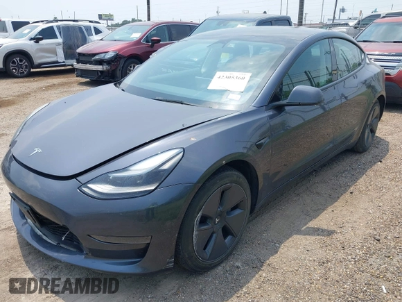 2023 Tesla Model 3 with VIN 5YJ3E1EA7PF409243, listed as a IAAI auction lot 42305360 with Not provided miles and . Bid and sale history available at DreamBid. Image 2.