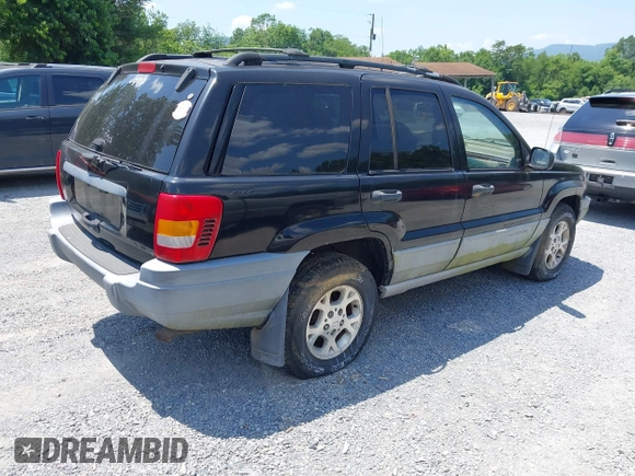 2000 Jeep Grand Cherokee Laredo with VIN 1J4GW48N7YC357376, listed as a IAAI auction lot 42503429 with 211,154 mi miles and . Bid and sale history available at DreamBid. Image 4.