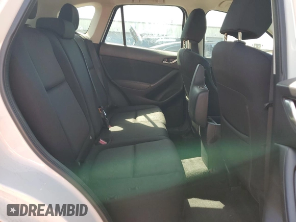 2016 Mazda CX-5 Sport с VIN JM3KE4BY1G0611368, выставлен на аукционе Copart как лот 56979385 с пробегом 106 397 миль миль и Списание • Salvage title. История ставок и продаж доступна на DreamBid. Изображение 11.