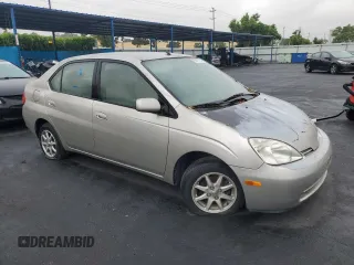 2003 Toyota Prius z VIN JT2BK18U430088533, wystawiony jako Copart lot #56091295 z przebiegiem 112 210 mil mil oraz Czysty tytuł • Clean title. Historia ofert i sprzedaży dostępna na DreamBid. Obrazek 4.