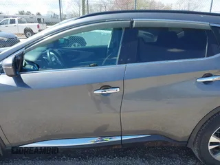 2015 Nissan Murano SL with VIN 5N1AZ2MH0FN291287, listed as a IAAI auction lot 41966094 with 167,066 mi miles and . Bid and sale history available at DreamBid. Image 14.