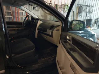 2010 Dodge Grand Caravan Crew with VIN 2D4RN6DX1AR438135, listed as a IAAI auction lot 41734378 with 57,041 mi miles and . Bid and sale history available at DreamBid. Image 5.